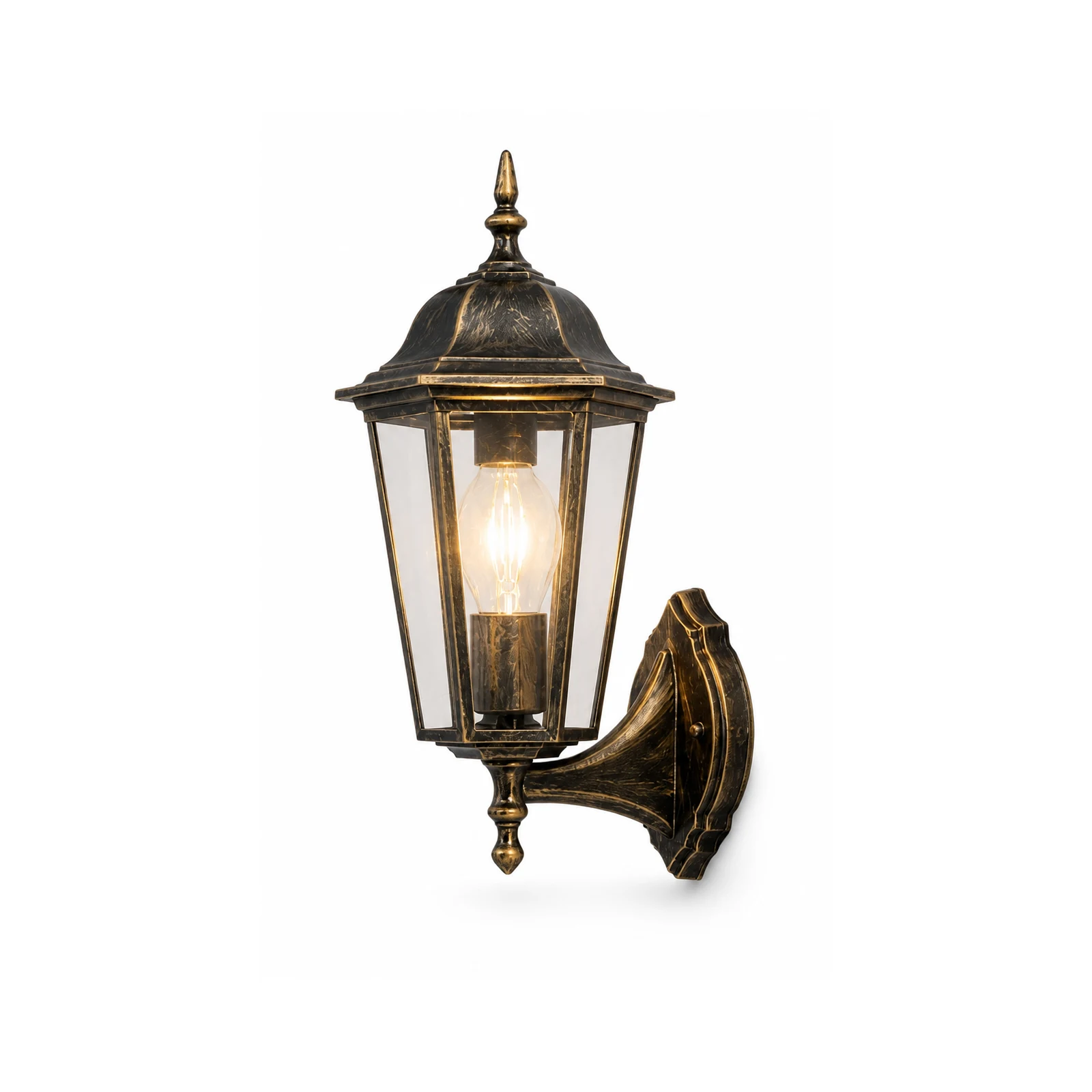Outdoor wall lantern in bronze finish on a villa wall at dusk