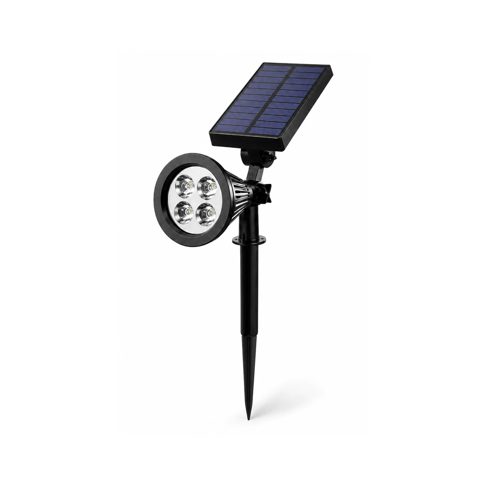 Solar spike spotlight uplighting a tree in a garden