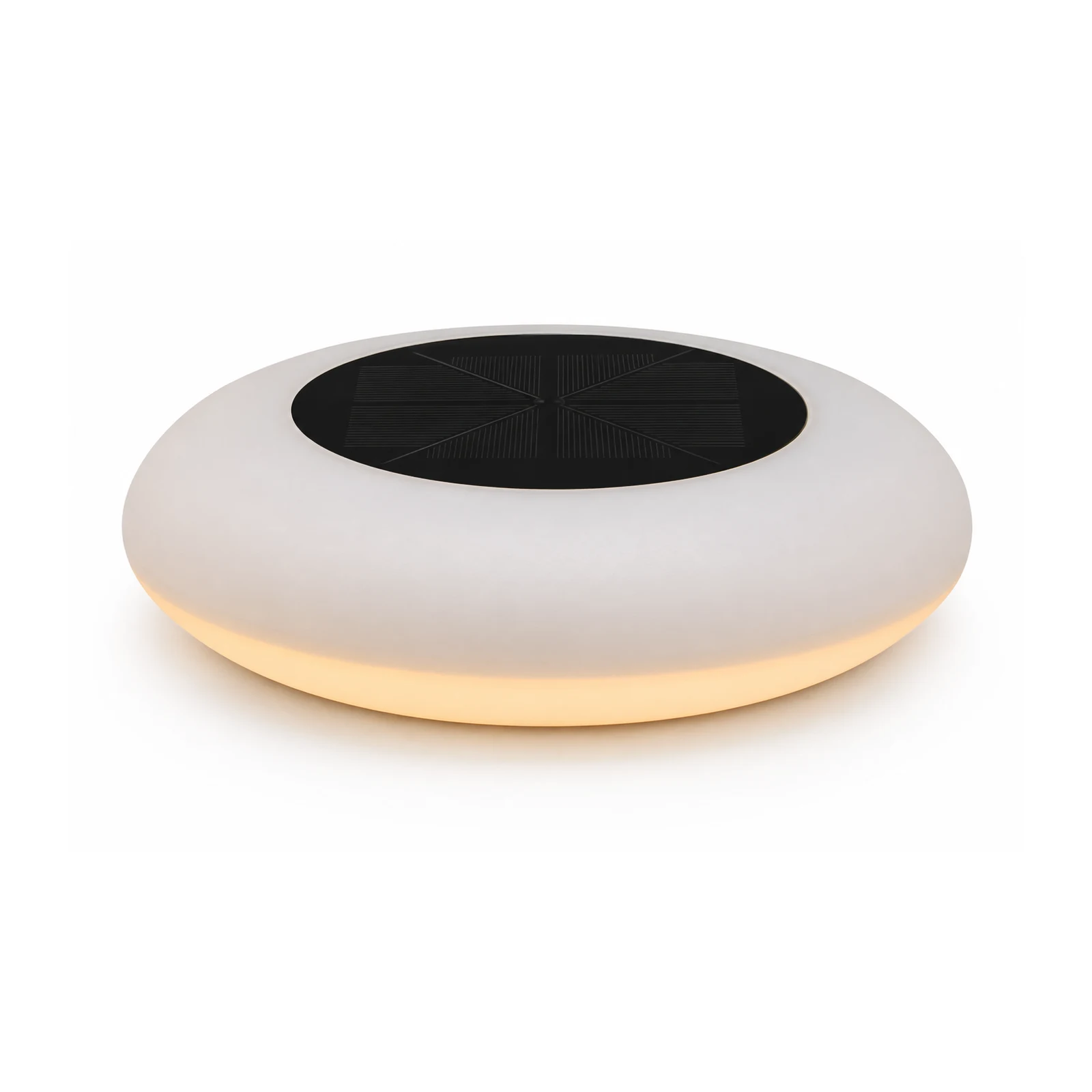 RGB solar pool float light glowing on the water at night